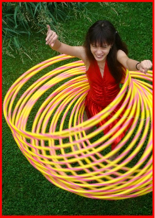 Mabelle spins dozens of Hula Hoops in her World Class Specialty Act for Shows of all kinds!